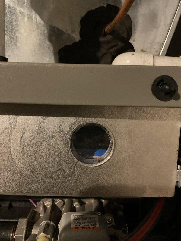 Performed scheduled tune-up on 5-year-old Lennox furnace. Inspected burner assembly through sight glass, checked heat exchanger integrity, and verified proper venting through PVC exhaust system. Unit is operating within manufacturer specifications with no issues detected.