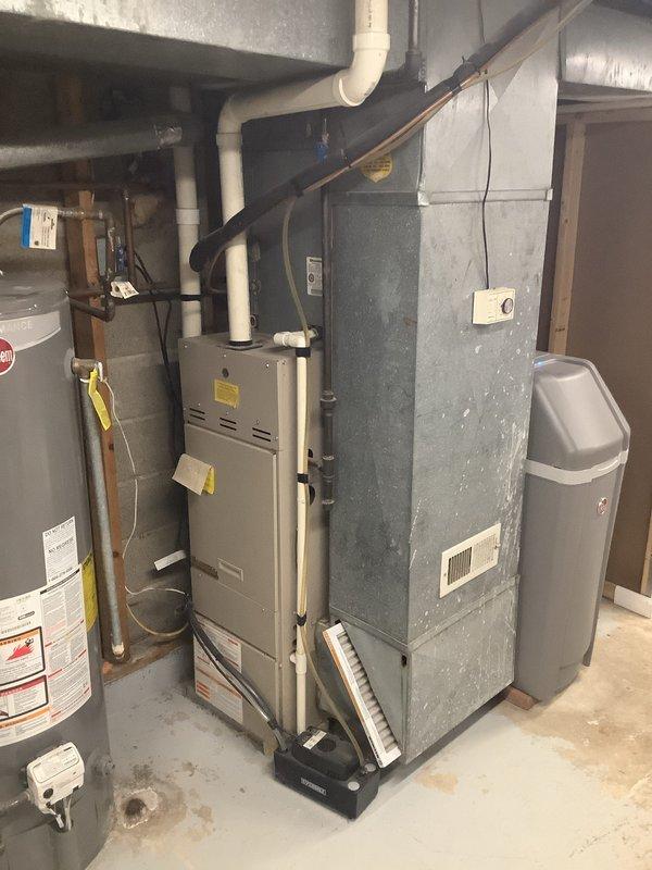 Installed a new 90% Furnace Replacement Network (FRN) system with matching air conditioning unit. Completed all necessary connections including PVC venting, electrical wiring, and refrigerant lines. System was properly mounted on concrete pad with appropriate clearances and tested for proper operation.
