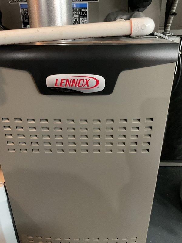 Performed scheduled MVP Heating Visit with filter replacement on Lennox furnace system. Inspected unit for proper operation and verified all components including PVC condensate drainage, exhaust venting, and attached AprilAire accessory were functioning correctly. Completed maintenance with photo documentation of the professionally installed system.