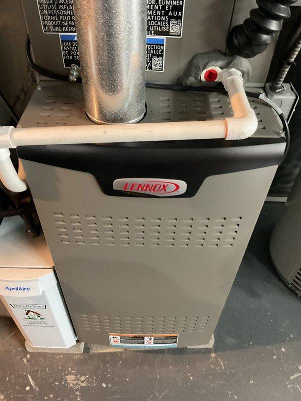 Performed scheduled MVP Heating Visit with filter replacement on Lennox furnace system. Inspected unit for proper operation and verified all components including PVC condensate drainage, exhaust venting, and attached AprilAire accessory were functioning correctly. Completed maintenance with photo documentation of the professionally installed system.