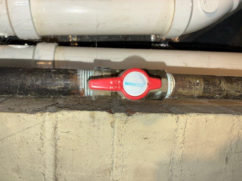 Performed tune-up service on 7-year-old Carrier furnace. Inspected system components including air handler, ductwork connections, and refrigerant lines, finding all in normal working condition. Examined plumbing components including NIBCO valve and associated piping, noting some aging and corrosion on metal components but confirming proper functionality.