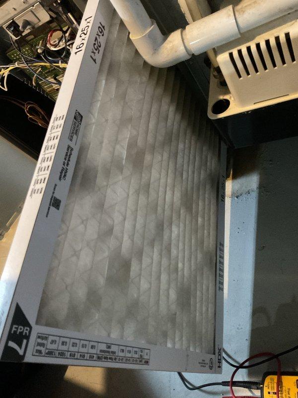 Performed scheduled furnace tune-up service. Inspected filtration system and found existing filter showing significant accumulation of particulate matter. Replaced standard 16x25x1 FPR 7 pleated air filter. Verified proper operation of all components including electrical connections and PVC venting system.