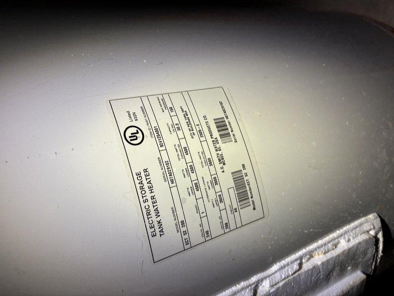 Completed furnace tune-up service as scheduled. During inspection, noted the presence of an A.O. Smith ProMax water heater installation with PEX water lines and appropriate venting. Verified water heater specifications from manufacturer label to ensure proper operation parameters.