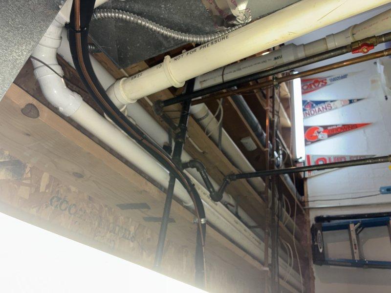 Completed scheduled MVP Heating Visit maintenance service. Inspected basement utility area, examining plumbing connections and PVC ventilation components. Identified and replaced a bent metal rod component in the heating system, restoring proper functionality.