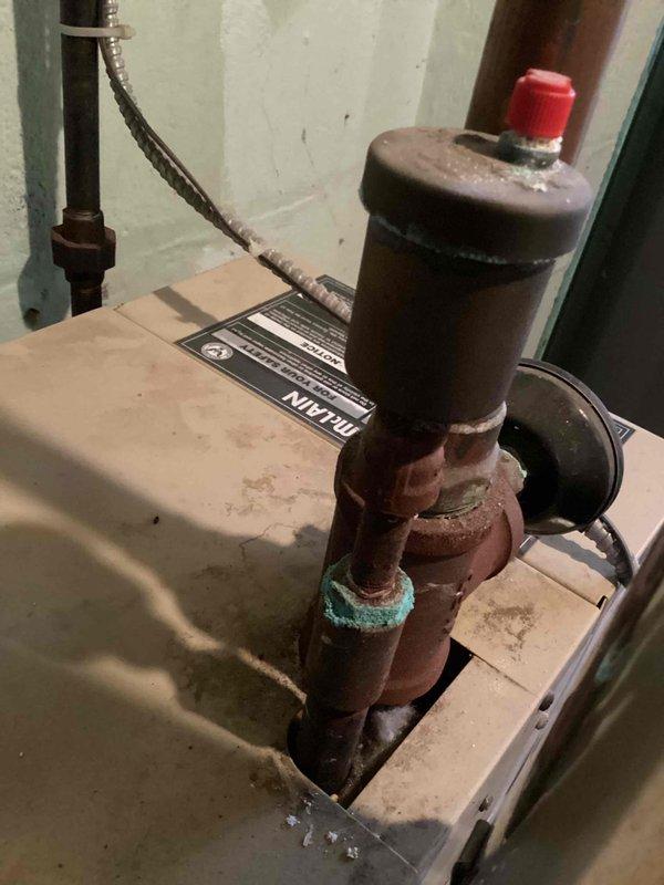 Performed comprehensive furnace tune-up per promotional service package. Inspected copper piping system with pressure regulator valve and identified minor oxidation on several joints. Examined shutoff valve functionality and verified proper operation of the boiler system with no immediate concerns requiring attention.