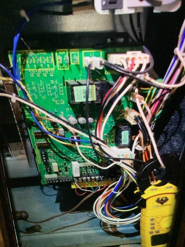 Performed scheduled preventive maintenance on two units under service contract. Inspected and tested control board circuitry with multimeter to verify proper operation. Replaced worn ignitor assembly with new component to prevent future heating failure.