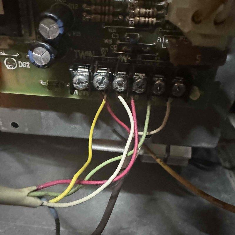 Diagnosed 26-year-old natural gas furnace with improper cycling issues causing continuous operation requiring manual shutdown. Inspection of interior ductwork and control board revealed age-related wear and potential terminal connection problems. Recommended replacement due to unit age and component deterioration.