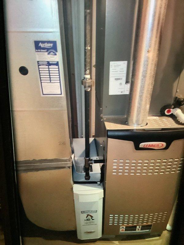 Performed scheduled MVP heating maintenance service on residential HVAC system featuring AprilAire air handler and Lennox furnace with integrated humidifier. Inspected complete system components, ductwork connections, and ventilation. Used hex key tool for necessary adjustments and completed all standard heating system checks to ensure proper operation for the heating season.