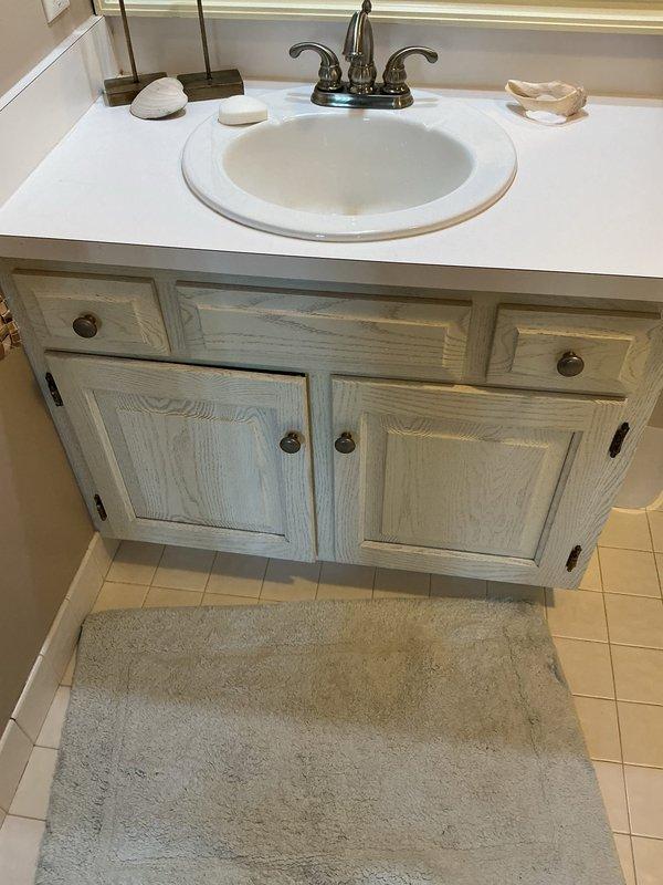 Successfully repaired bathroom sink faucet that was dripping by replacing worn internal components. Also replaced leaking shut-off valves under the sink with new quarter-turn valves to prevent future water damage. Tested all connections for proper operation and verified no leaks present after repair.