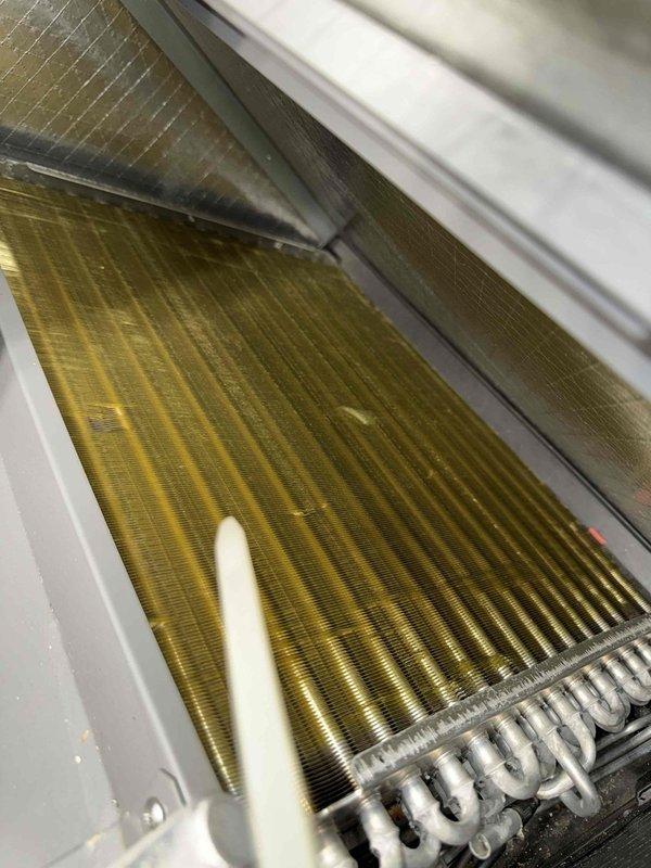 Performed annual maintenance on a 3-year-old furnace. Inspected control board functionality and electrical connections, noting all components in good working order with proper LED indicator response. Examined evaporator coil assembly which showed minimal buildup and good condition, with appropriate refrigerant line connections maintaining system integrity.