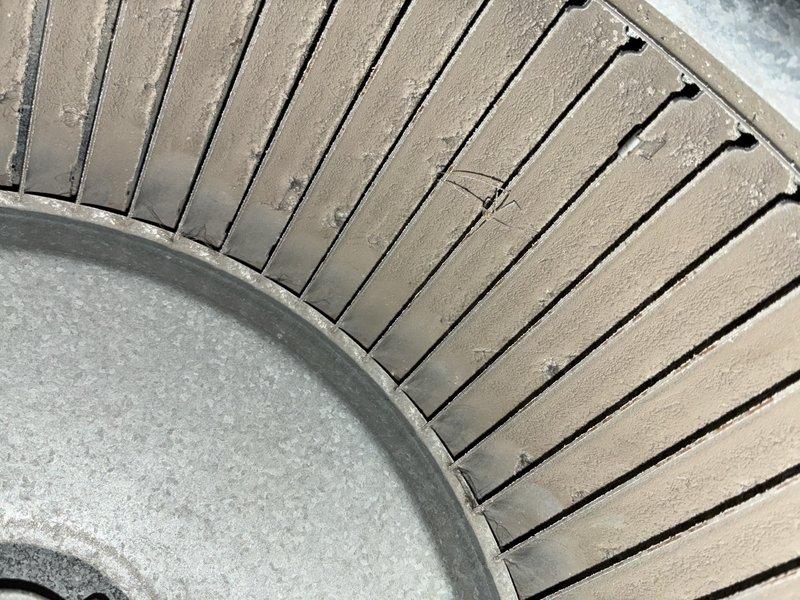 Performed scheduled MVP Heating maintenance service. Inspected heat exchanger which showed dust accumulation between fins requiring cleaning. Noted significant rust formation on motor mounting bracket while motor itself remains operational with proper electrical connections intact. System restored to proper working condition.