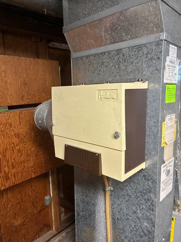 Performed scheduled MVP heating maintenance service, inspecting the air handling unit with attached humidifier. Utilized hex key tool to make necessary adjustments and ensure proper system function. All components were verified to be securely mounted and operating according to manufacturer specifications.