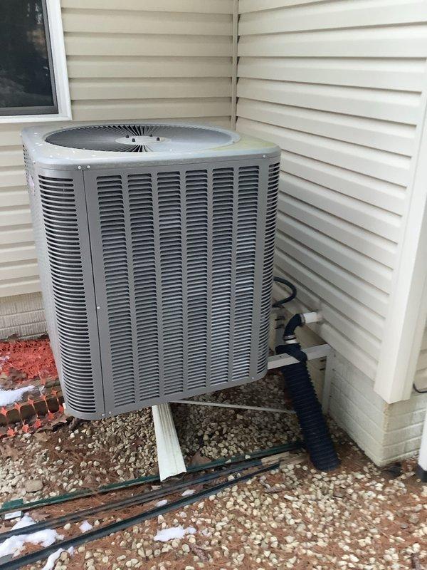 Successfully completed heat pump replacement with installation of new Lennox outdoor unit on concrete pad with proper drainage. System was properly connected to existing electrical and refrigerant lines, with all connections tested and verified for optimal performance.