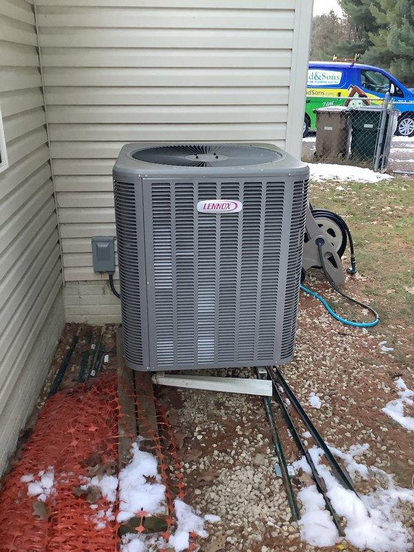 Successfully completed heat pump replacement with installation of new Lennox outdoor unit on concrete pad with proper drainage. System was properly connected to existing electrical and refrigerant lines, with all connections tested and verified for optimal performance.