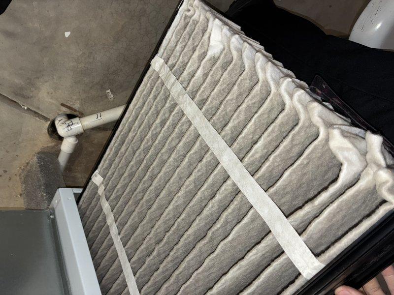 Performed preventive maintenance on 4-year-old gas furnace (MVP model). Replaced heavily soiled air filter showing significant dust accumulation in pleats. Inspected outdoor Lennox condenser unit, confirming proper installation on concrete pad with appropriate clearance for airflow.