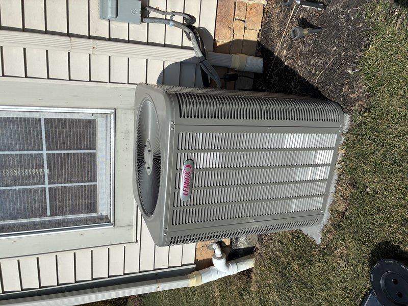 Performed preventive maintenance on 4-year-old gas furnace (MVP model). Replaced heavily soiled air filter showing significant dust accumulation in pleats. Inspected outdoor Lennox condenser unit, confirming proper installation on concrete pad with appropriate clearance for airflow.