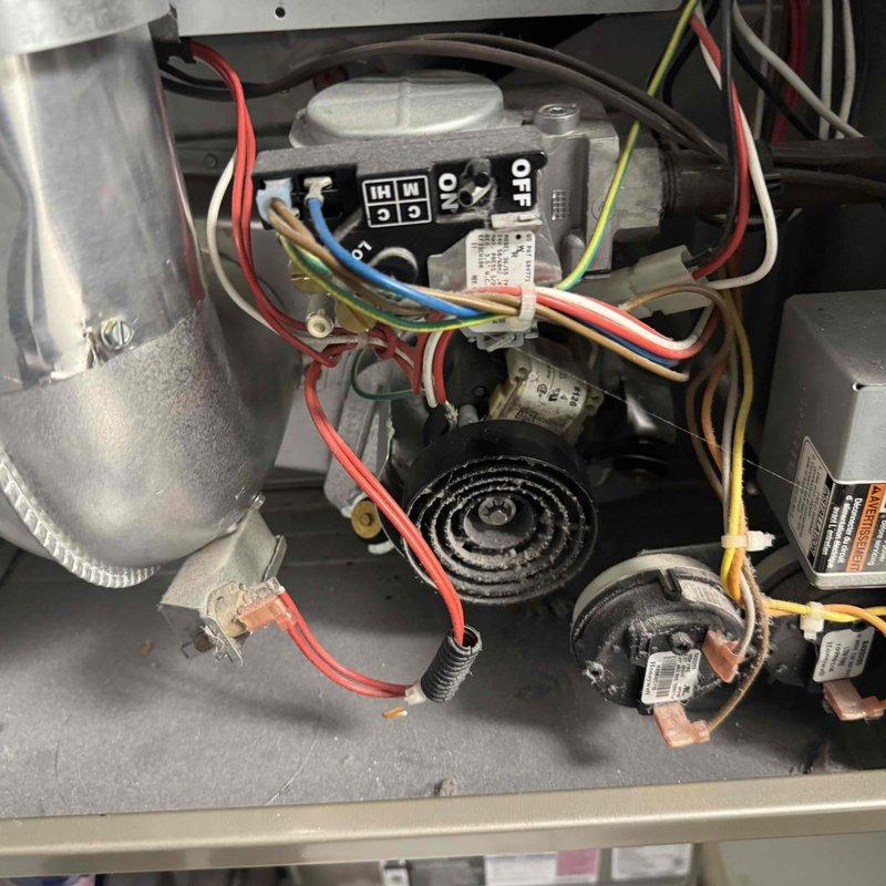 Performed comprehensive maintenance service on two aging furnace units (15+ and ~30 years old). Inspected control mechanisms, electrical connections, gas regulators, and blower components on both systems. Both units were operational after service despite advanced age; recommended continued monitoring of the older unit for potential future replacement.