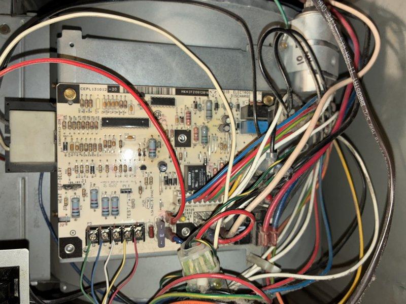 Completed MVP furnace maintenance service, including inspection of the control board (CEPL131012) with verification of all wire connections and component integrity. Documented system condition with photos showing proper circuit board operation and wiring configuration.