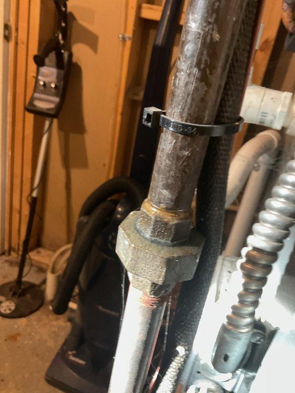 Performed scheduled MVP heating maintenance service. Conducted electrical testing on system components using digital multimeter, measuring resistance values at 53.5 ohms. Inspected copper piping and connections, noting mineral buildup and corrosion on main supply line that requires monitoring but is currently functioning within acceptable parameters.