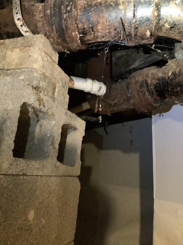Installed customer supplied water closet in basement utility room. Found significant corrosion on existing cast iron waste pipe requiring installation of PVC transition fitting. Completed installation without complications as requested.