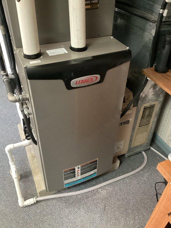 Performed routine MVP heating maintenance service on a Lennox furnace system. Inspected unit and discovered heavily soiled filter with substantial dust accumulation requiring immediate replacement. System was otherwise in good working condition with properly connected PVC venting and no visible damage to the main unit.