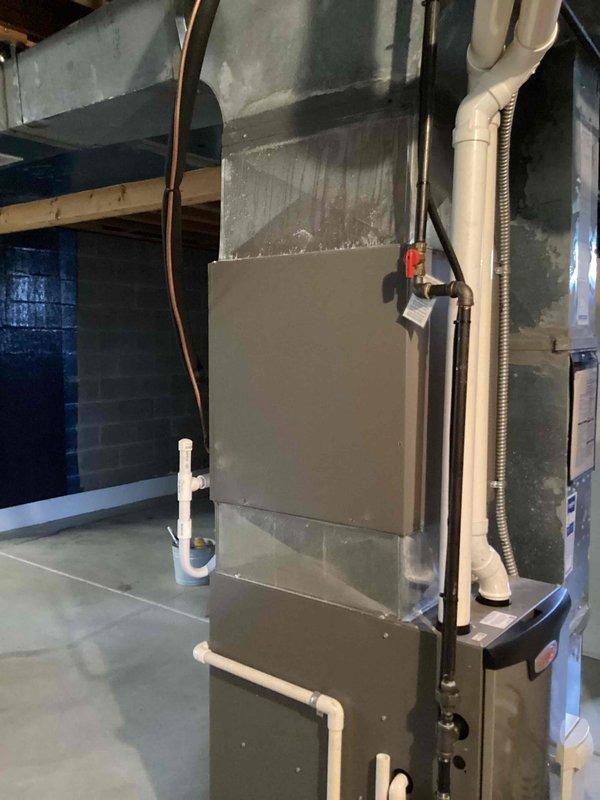 Performed comprehensive furnace maintenance tune-up for MVP customer on rescheduled appointment. Inspected gas furnace system including PVC condensate drainage lines, supply connections, and ventilation components. System appears to be properly installed with appropriate connections in basement utility area; no issues were identified during the service visit.