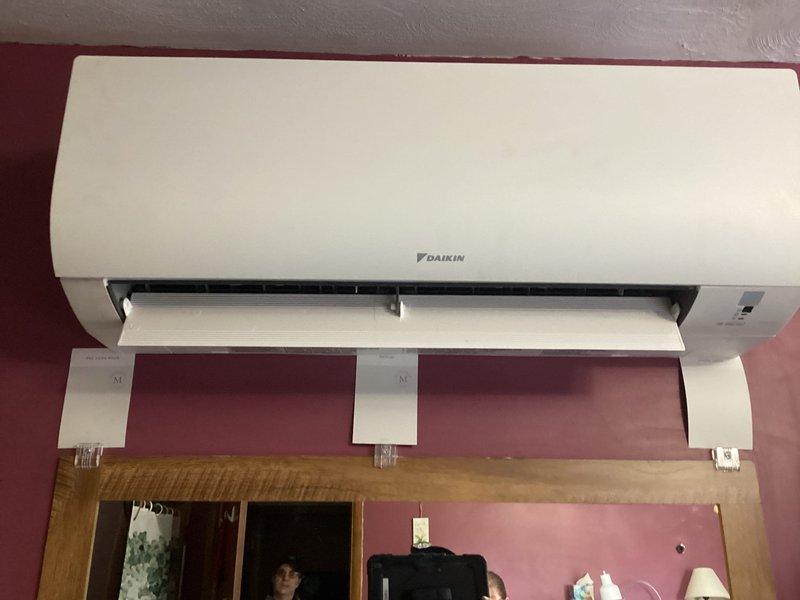 Performed follow-up service on previously installed Daikin mini-split system that was producing excessive noise and operational issues. Inspected interior components and mounting hardware, confirming loose connections were causing vibration. Secured all mounting brackets, reinstalled the front panel cover, and verified proper operation with significantly reduced noise levels.