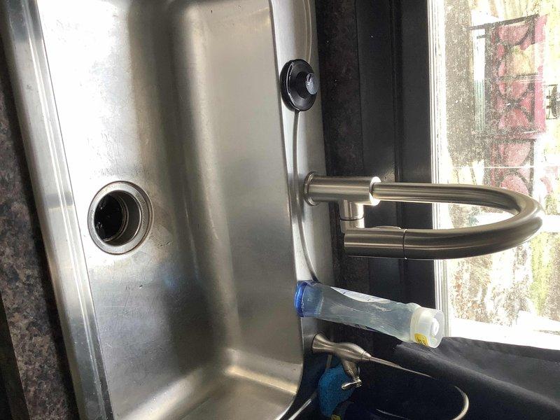 Responded to service call for a blind customer reporting an overflowing sink. Inspected the stainless steel kitchen sink and associated plumbing components, identifying a clogged drain causing water backup. Successfully cleared the blockage in the P-trap configuration and verified proper drainage function, ensuring the sink would no longer overflow and pose safety hazards for the resident.