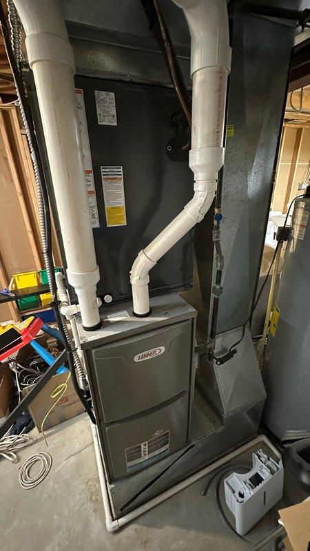 Performed routine maintenance on Lennox furnace system as part of scheduled MVP Heating service. Inspected all components including exhaust/intake PVC venting, condensate system, and electrical connections, confirming proper operation. Discussed options for humidifier installation and provided customer with requested quote.