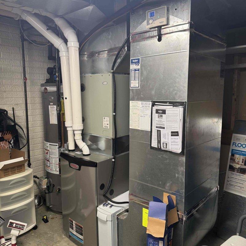 Performed scheduled MVP furnace maintenance visit, inspecting the basement-installed HVAC system including the main furnace unit and associated ductwork. Examined the ECM drive control board which displayed a "3" code, verified all electrical connections were secure, and confirmed proper operation of all components including the PVC venting system.