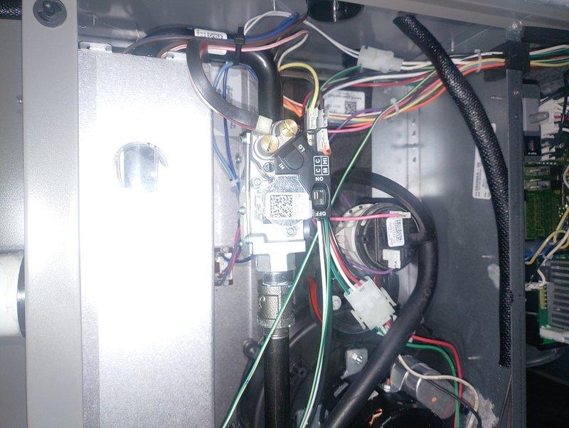 Performed comprehensive annual maintenance on 2-year-old furnace. Inspected control board and electrical connections, confirming proper wire routing and secure terminal connections. All electronic components and circuit boards were found in normal working condition with no visible damage or deterioration.