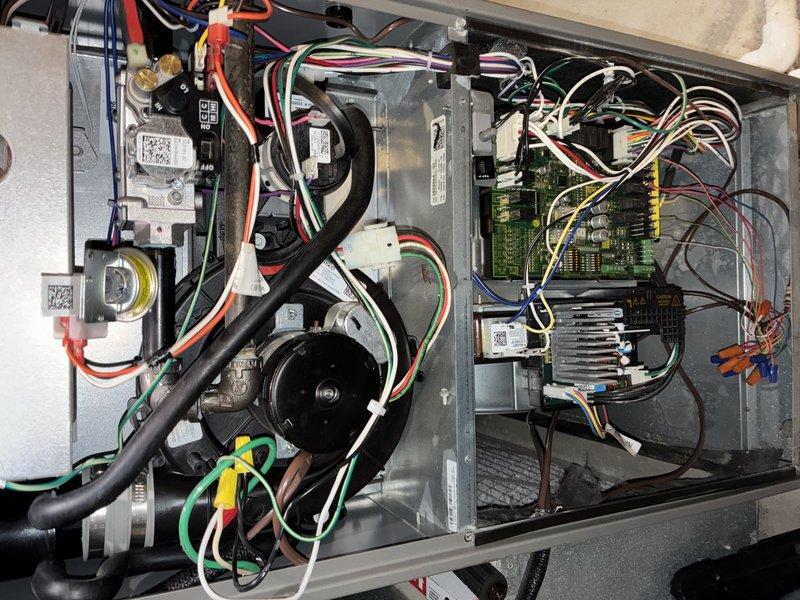 Performed scheduled heat pump maintenance service. Inspected electrical components and connections in control panel, ensuring proper wire terminations and circuit board functionality. Checked and tightened mechanical fasteners with hex key to ensure system stability and proper operation.