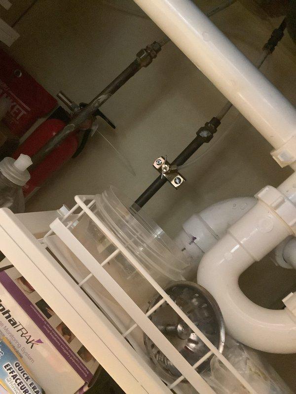 Successfully installed customer-supplied kitchen faucet in double-basin porcelain sink. Completed installation with proper connections and verified functionality. No additional parts were required for the installation.