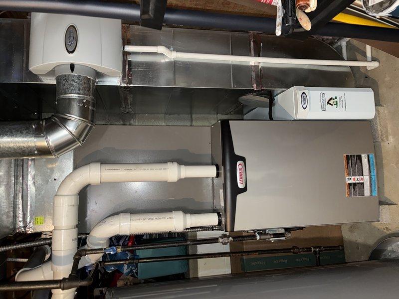 Performed annual furnace maintenance on Lennox heating system, including inspection of PVC intake/exhaust venting, ductwork, and attached humidifier unit. Renewed customer's maintenance value plan, though noted system issue with recurring service scheduling that required manual adjustment from December 26 to March 2.
