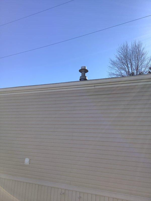 Performed site assessment for replacement of existing natural gas water heater. Inspected exterior venting system and verified appropriate termination point. Examined interior plumbing connections including copper supply lines and valve assembly. Provided customer with installation options and scheduled future installation appointment.