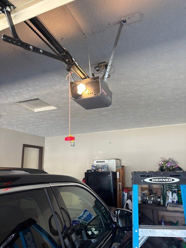 Diagnosed and repaired garage spotlight electrical issue by replacing damaged transformer mounted on the wooden backing panel. Restored functionality to the non-working doorbell system by reconnecting loose wiring and testing the circuit to verify proper operation.