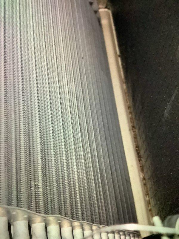 Performed routine maintenance on 5-year-old gas furnace for MVP customer. Inspection revealed significant ice buildup on evaporator coils indicating possible defrost cycle failure or refrigerant leak. Cleaned heat exchanger and inspected finned surfaces for proper operation.