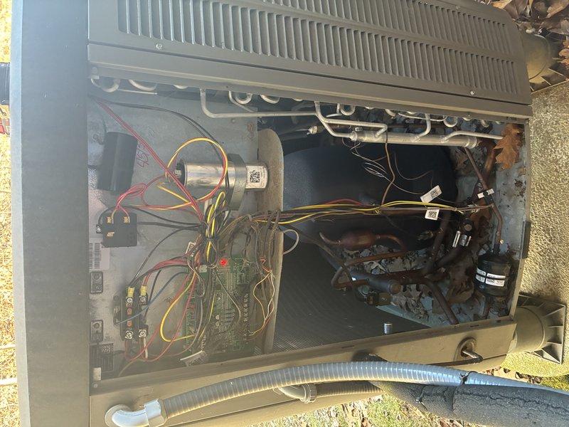 Performed MVP Cooling maintenance service on residential Lennox HVAC system located in utility room. Inspected interior components including motor, circuit board, and refrigeration system, noting normal operational wear without obvious damage. Documented system condition with photos showing furnace unit with connected ductwork, condensate drainage, and electrical components, all appearing to be in working order.