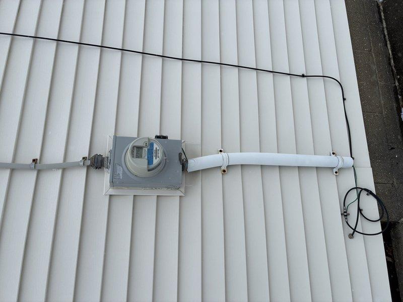 Completed 100A service upgrade with installation of exterior disconnect to comply with 2023 National Electrical Code requirements. Updated grounding system as needed and properly secured conduit and wiring to building's exterior metal siding. Verified proper meter installation and functionality.