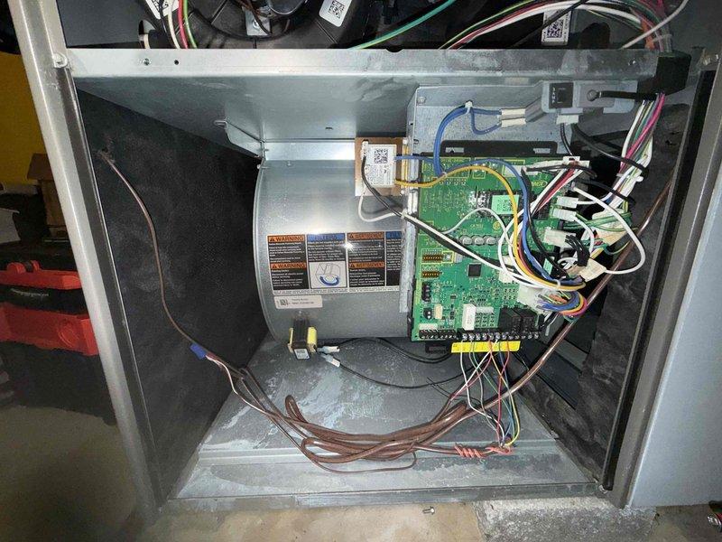 Performed scheduled maintenance on MVP furnace system. Inspected copper refrigerant lines and checked for proper condensation drainage. Examined blower motor assembly and control board components, verifying all electrical connections and wire harnesses were secure with no signs of wear or damage.
