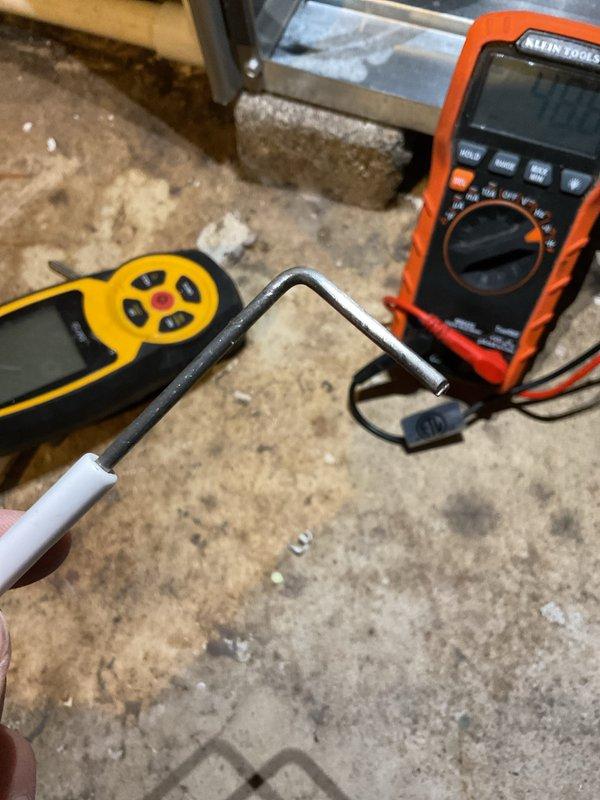 Completed scheduled heating maintenance service. Performed electrical diagnostics using Klein Tools multimeter, measuring system voltage at 186V. Conducted thorough inspection of HVAC components including copper lines and electrical connections to ensure proper operation for the heating season.