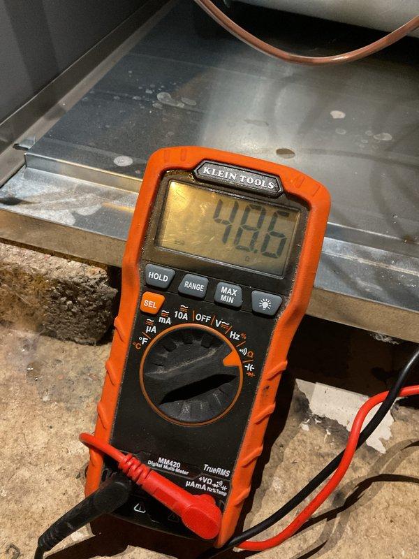 Completed scheduled heating maintenance service. Performed electrical diagnostics using Klein Tools multimeter, measuring system voltage at 186V. Conducted thorough inspection of HVAC components including copper lines and electrical connections to ensure proper operation for the heating season.