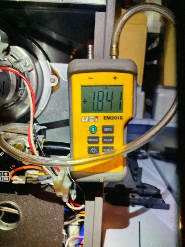 Conducted scheduled MVP heating maintenance on 7-year-old system. Performed visual inspection of system components and measured static pressure reading of +1841 Pa using UEi EM201B meter. System filter condition was examined and appears to be functioning within normal parameters.