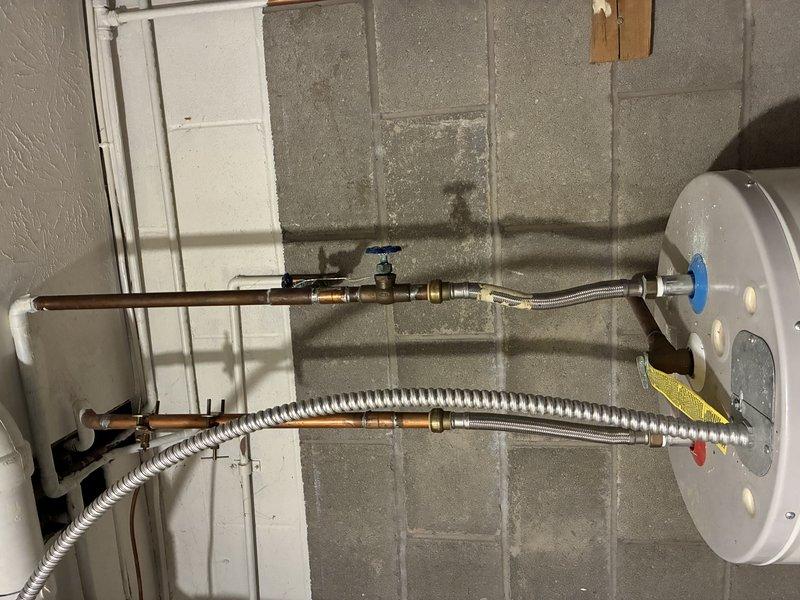 Conducted assessment for chandelier installation in high-ceiling area. Documented existing electrical connections and mounting hardware for proper replacement. Determined need for specialized ladder equipment and potentially two technicians due to installation height requirements.