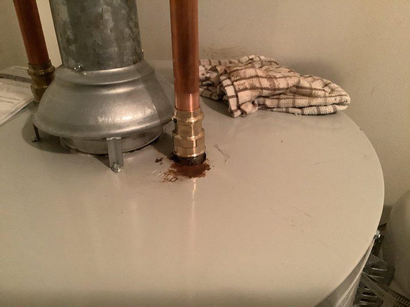 Replaced failed expansion tank with new assembly including tee, tank, and proper bracket to ensure secure installation. Removed and replaced damaged cold water diptube with new diptube and female adapter compatible with RG240S6N water heater. Corrected previous installation issues to ensure proper functionality and prevent future corrosion at pipe connections.