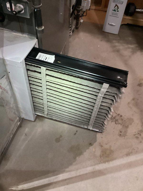 Performed routine maintenance on 6-year-old furnace system. Inspected and cleaned air filter showing moderate dust accumulation. Examined evaporator coil which displayed minor debris buildup but remains in functional condition.