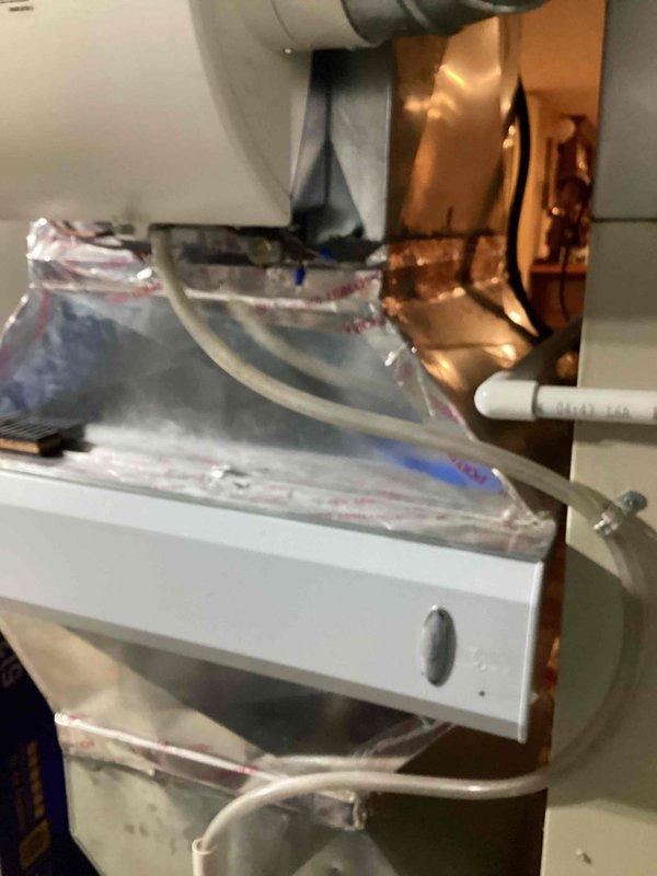 Successfully replaced solenoid on customer-supplied Honeywell Envirac Elite humidifier system. Completed installation and verified proper operation of the unit mounted to existing ductwork in utility area.