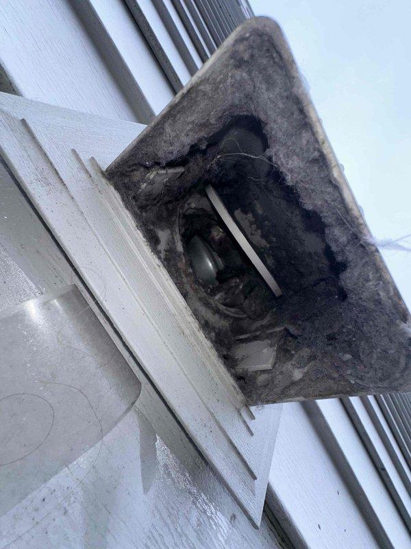 Performed annual dryer vent cleaning service as requested. Inspection revealed significant lint and debris accumulation in the exterior vent, with visible obstructions that were restricting proper airflow. Thoroughly cleaned all buildup from the vent system to restore optimal dryer performance and reduce fire hazards.