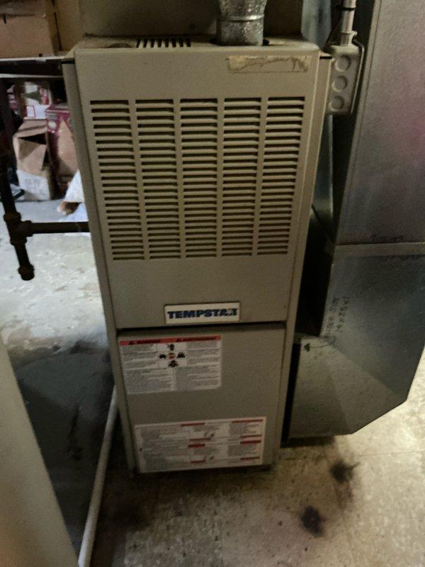 Assessed no-heat complaint on older Tempstar furnace in basement. Inspection revealed significant corrosion on ductwork joints and deteriorating connections. Replacement recommended due to age of system, visible deterioration, and previous service history.