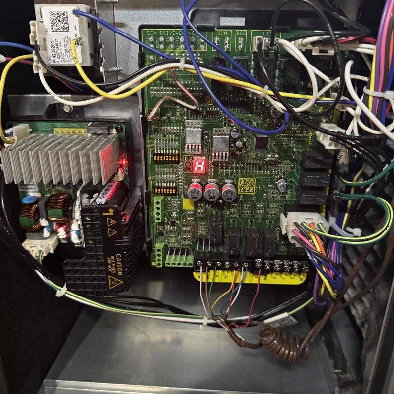 Performed scheduled furnace maintenance, which included inspection of the blower motor assembly and verification of proper electrical connections. Examined ECM driver board functionality with all components properly connected and operational as indicated by normal display readings.